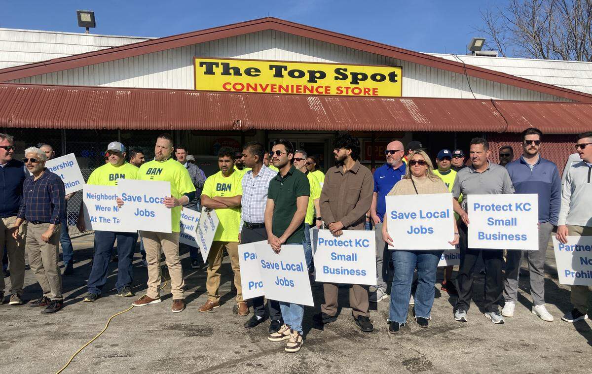 About 70 people, convenience store owners and employees, gathered at The Top Spot Convenience Store at 26th Street and Brooklyn Avenue on March 30, to protest against a proposed ordinance to ban the sale of mini-liquor bottles and single-serve beer and malt liquor in certain areas of Kansas City.