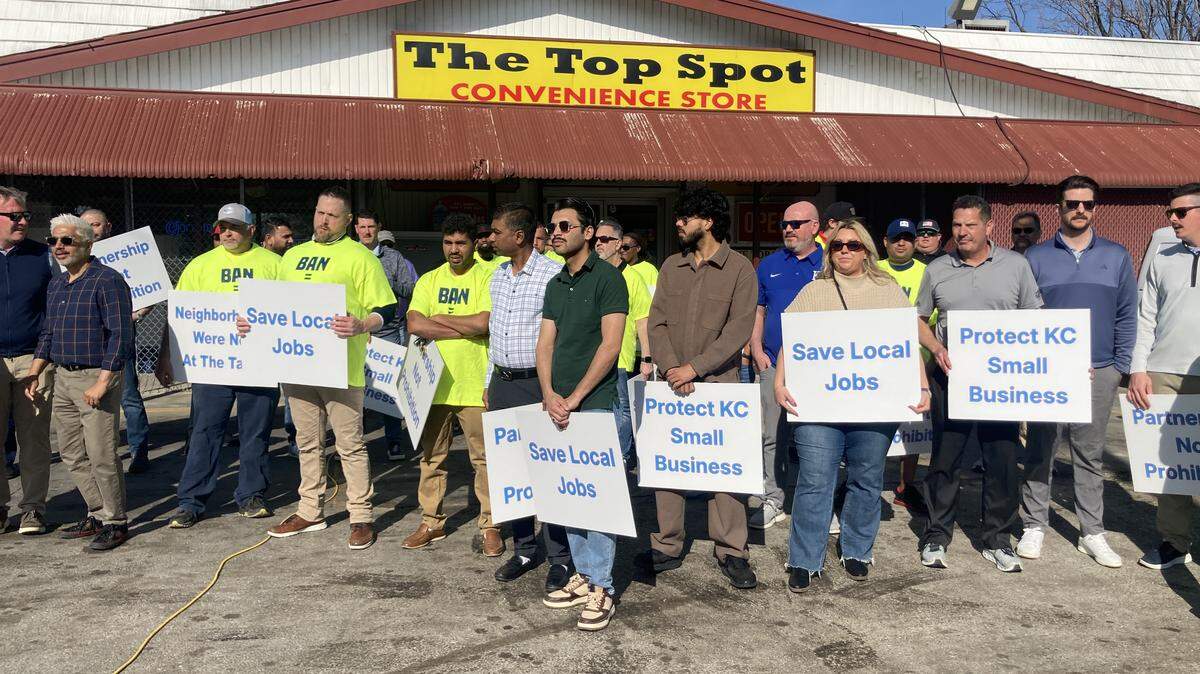 About 70 people, convenience store owners and employees, gathered at The Top Spot Convenience Store at 26th Street and Brooklyn Avenue on March 30, to protest against a proposed ordinance to ban the sale of mini-liquor bottles and single-serve beer and malt liquor in certain areas of Kansas City. The ordinance passed in April, but a lawsuit seeks to block it before enforcement begins.
