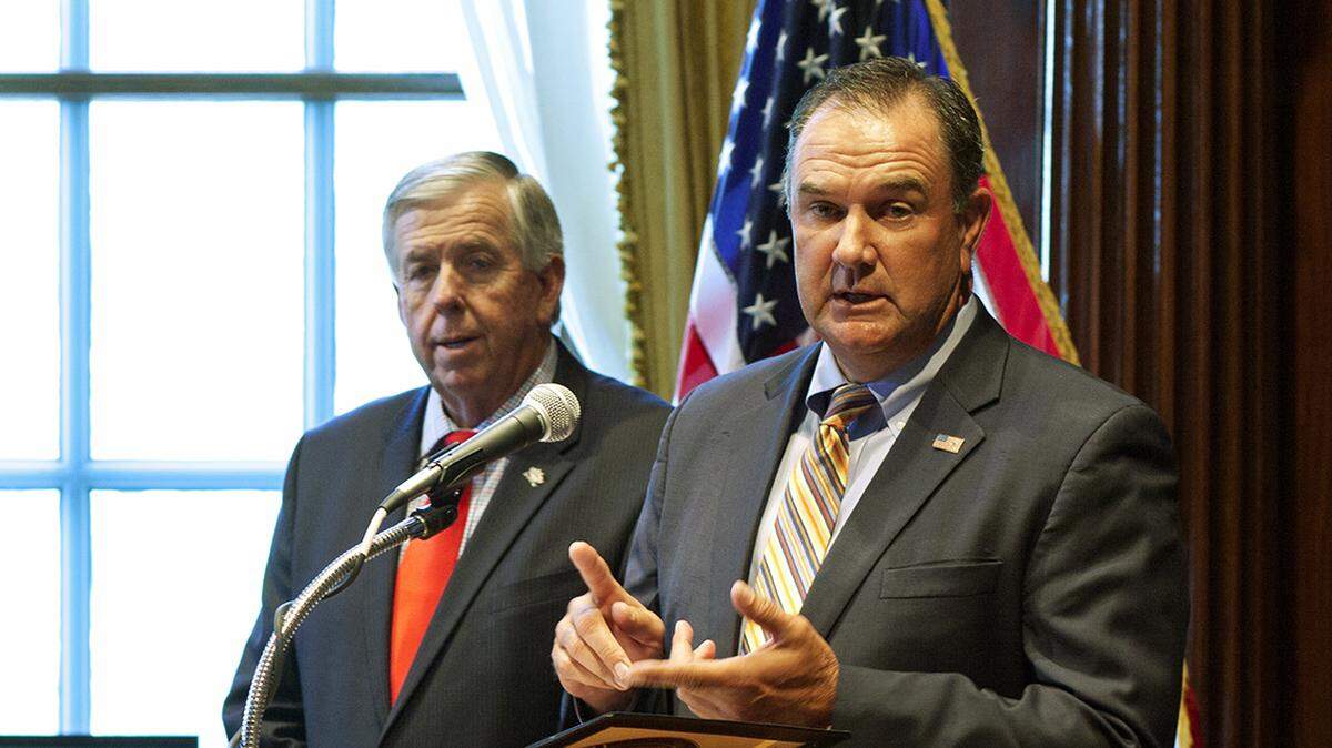 Missouri Gov. Mike Parson, left, appointed Senate Majority Leader Mike Kehoe to the office of lieutenant governor, despite some legal uncertainty about whether he has the authority to fill the position.