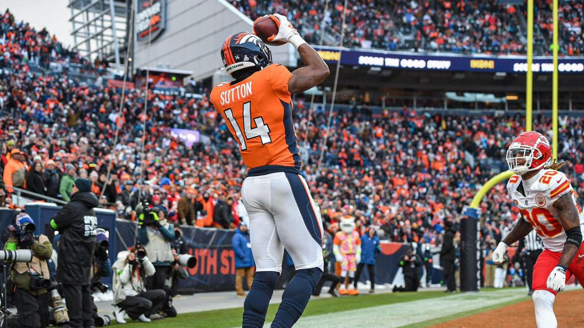 Denver Broncos wide receiver Courtland Sutton (14) pulls in a reception for a touchdown in front of Kansas City Chiefs safety Justin Reid (20) in the fourth quarter Sunday, October 29, 2023, at Mile High Stadium in Denver.