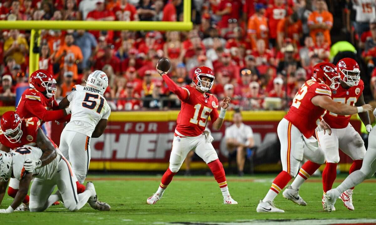 Kansas City Chiefs quarterback Patrick Mahomes (15) throws a pass against the Denver Broncos at Arrowhead Stadium in Kansas City on Sept. 14, 2026.