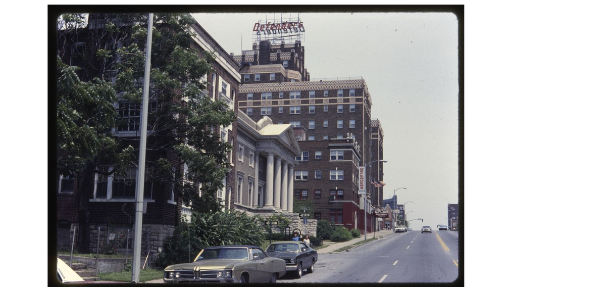 Photograph of the Kansas City Athenaeum building at the corner of Campbell St. and Linwood Boulevard circa 1981. The building, designed by architect Samuel Tarbet and opened in 1914, serves as the home for the Kansas City Women’s Athenaeum Club, which was founded in 1894 and focused on cultural programming for local women.