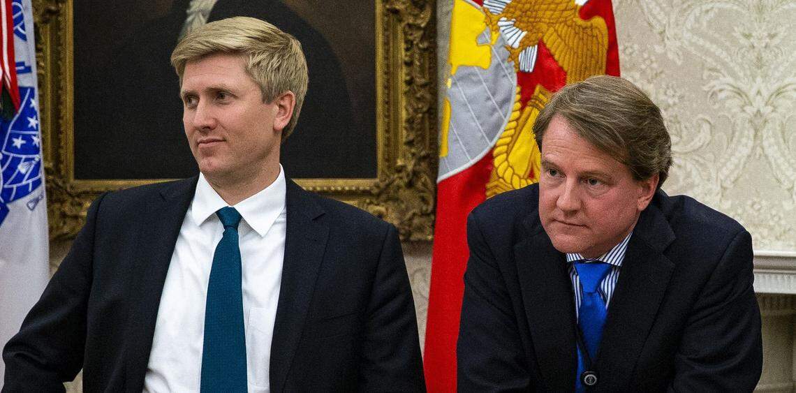 Nick Ayers (left), Vice President Mike Pence’s chief of staff, and Don McGahn, the White House counsel, watch as President Donald Trump speaks after signing an executive order on immigrant family separations on June 20.
