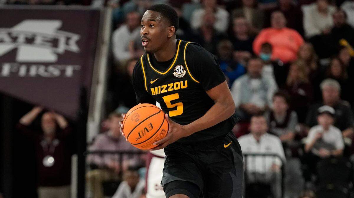 Missouri guard D’Moi Hodge (5) looks to pass during an NCAA college basketball game against Mississippi State in Starkville, Miss., Saturday, Feb. 4, 2023. Mississippi State won 63-52.