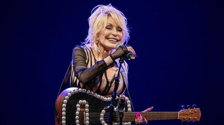 Before her death, Dolly Parton thanked Swift, Kelce for book program donation