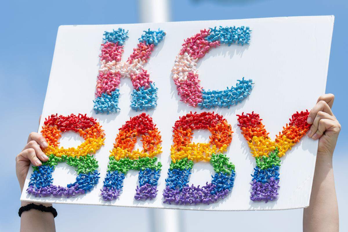 A fan holds a sign made of miniature babies during the Kansas City Current's match vs. Boston Legacy FC on Saturday, May 30, 2026, at CPKC Stadium.