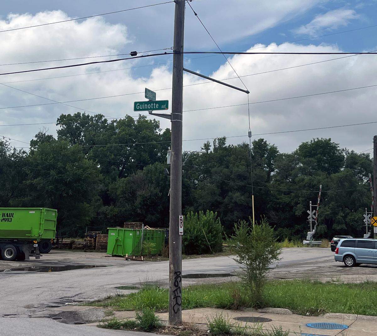 The intersection of Lydia and Guinotte avenues. The tracks of the Union Pacific Railroad, seen in the rear of the image, follow Guinotte’s Railroad Avenue.