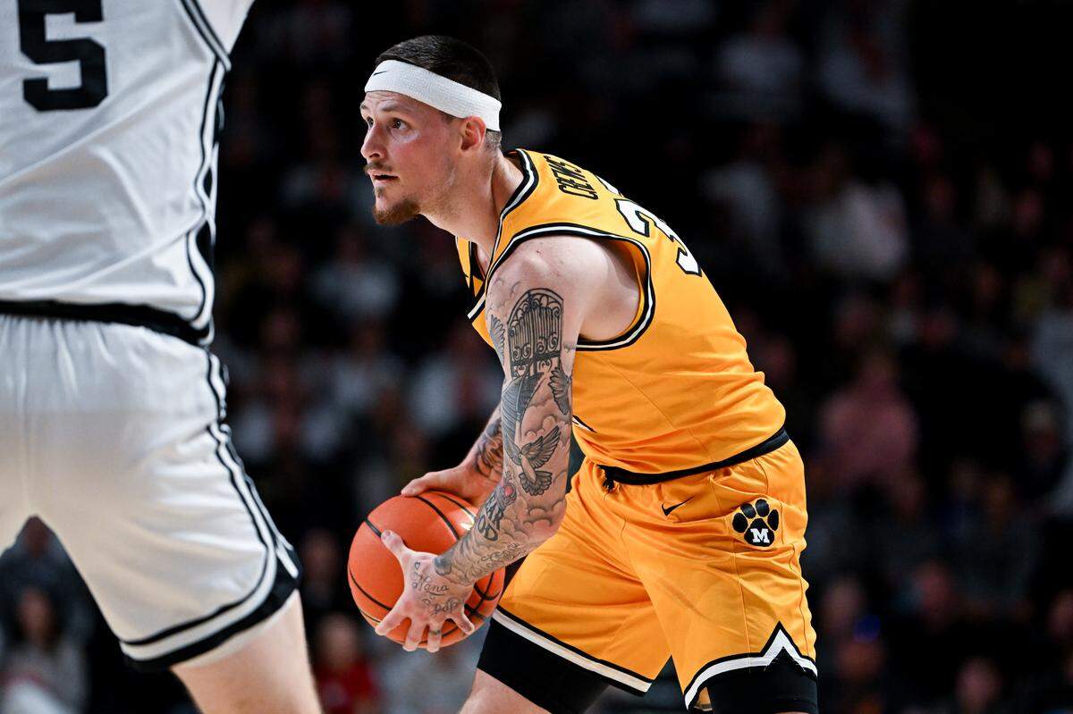 Jacob Crews #35 of the Missouri Tigers looks to pass the ball against the Vanderbilt Commodores in the first half at Vanderbilt University Memorial Gymnasium on March 1, 2025 in Nashville.