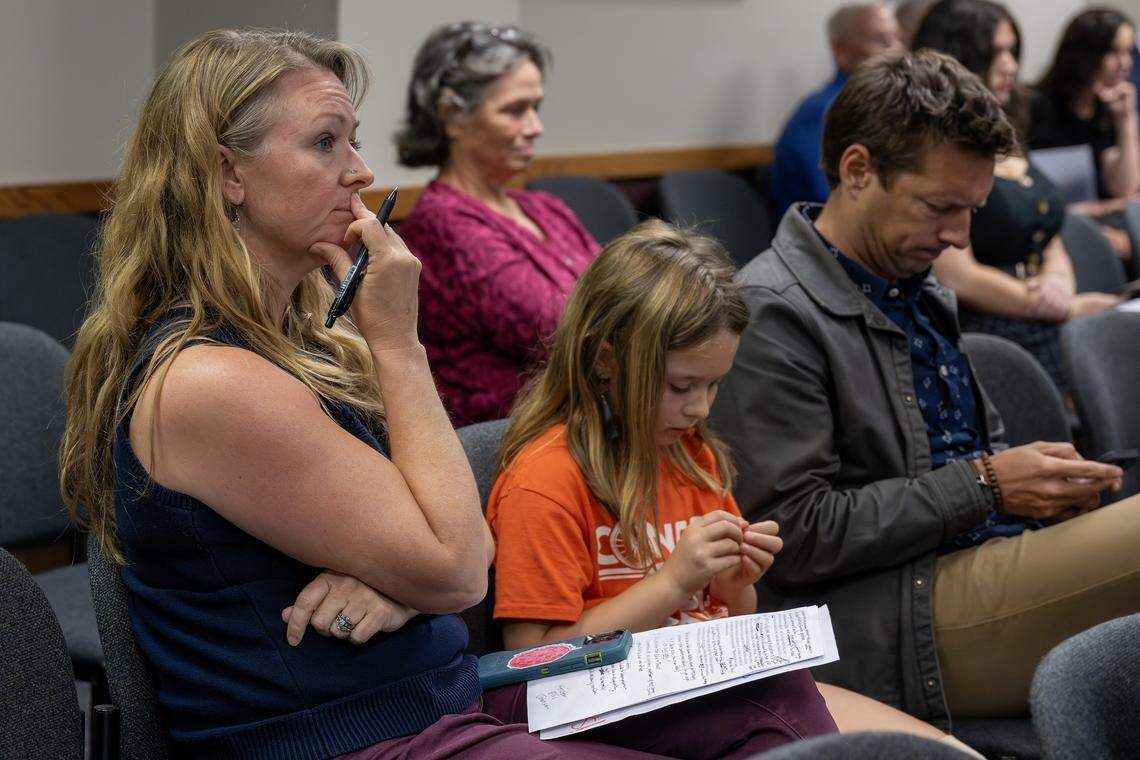 Kristen Ellis Johnson watches as people testify during a hearing on redrawing congressional district maps on Thursday, Sept. 4, 2025, in Jefferson City.