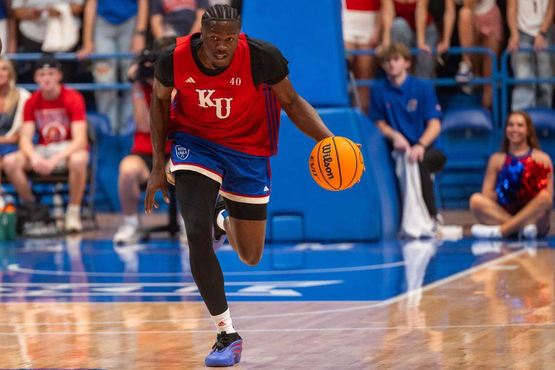 Kansas Jayhawks forward Flory Bidunga dribbles the ball up the court during the men's scrimmage at Late Night in the Phog, on Friday, October 17, 2025, in Lawrence.