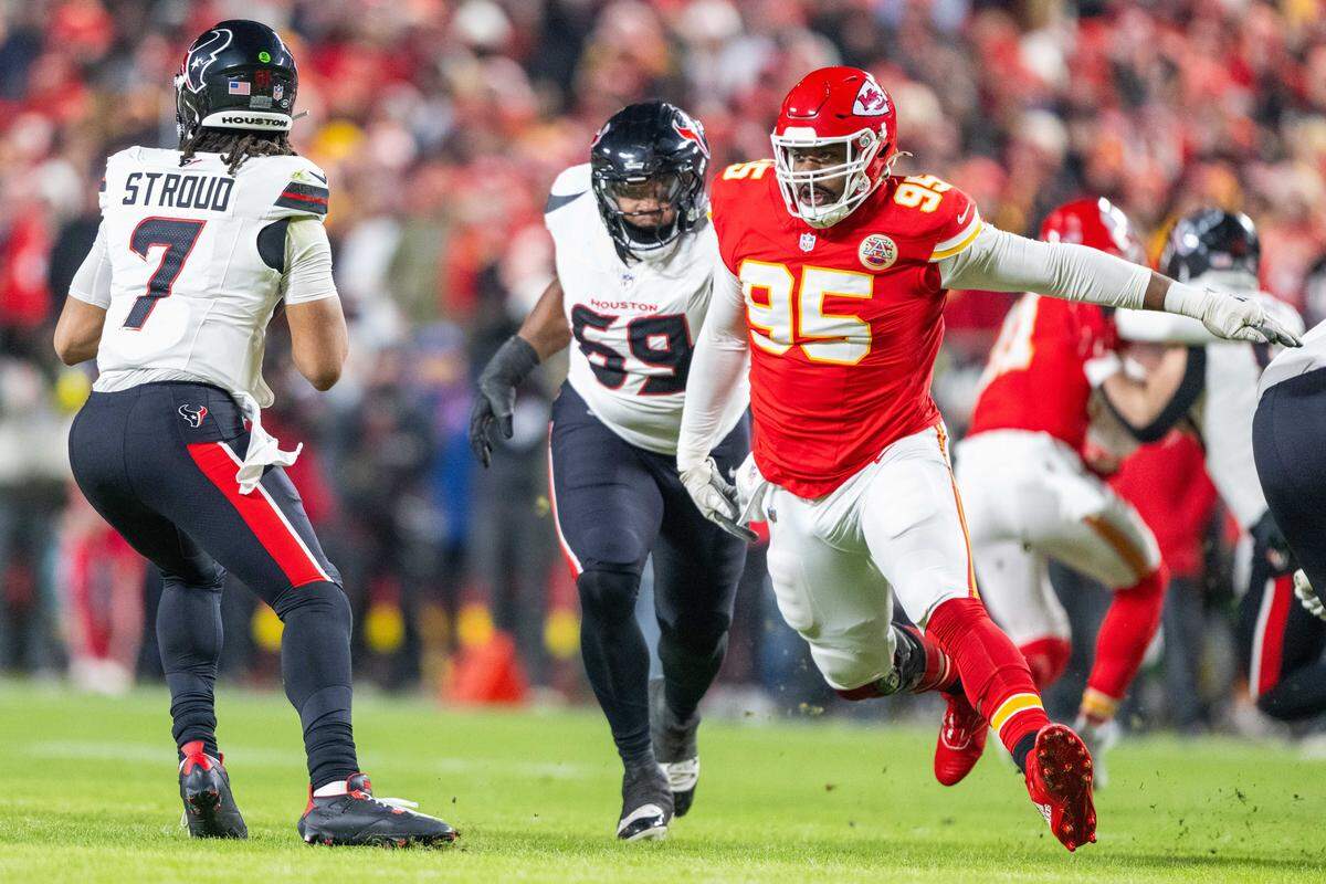 Kansas City Chiefs defensive tackle Chris Jones (95) puts pressure on Houston Texans quarterback C.J. Stroud (7) in the first half of the Chiefs game vs. the Houston Texans on Sunday, December 7, 2025, at GEHA Field at Arrowhead Stadium.