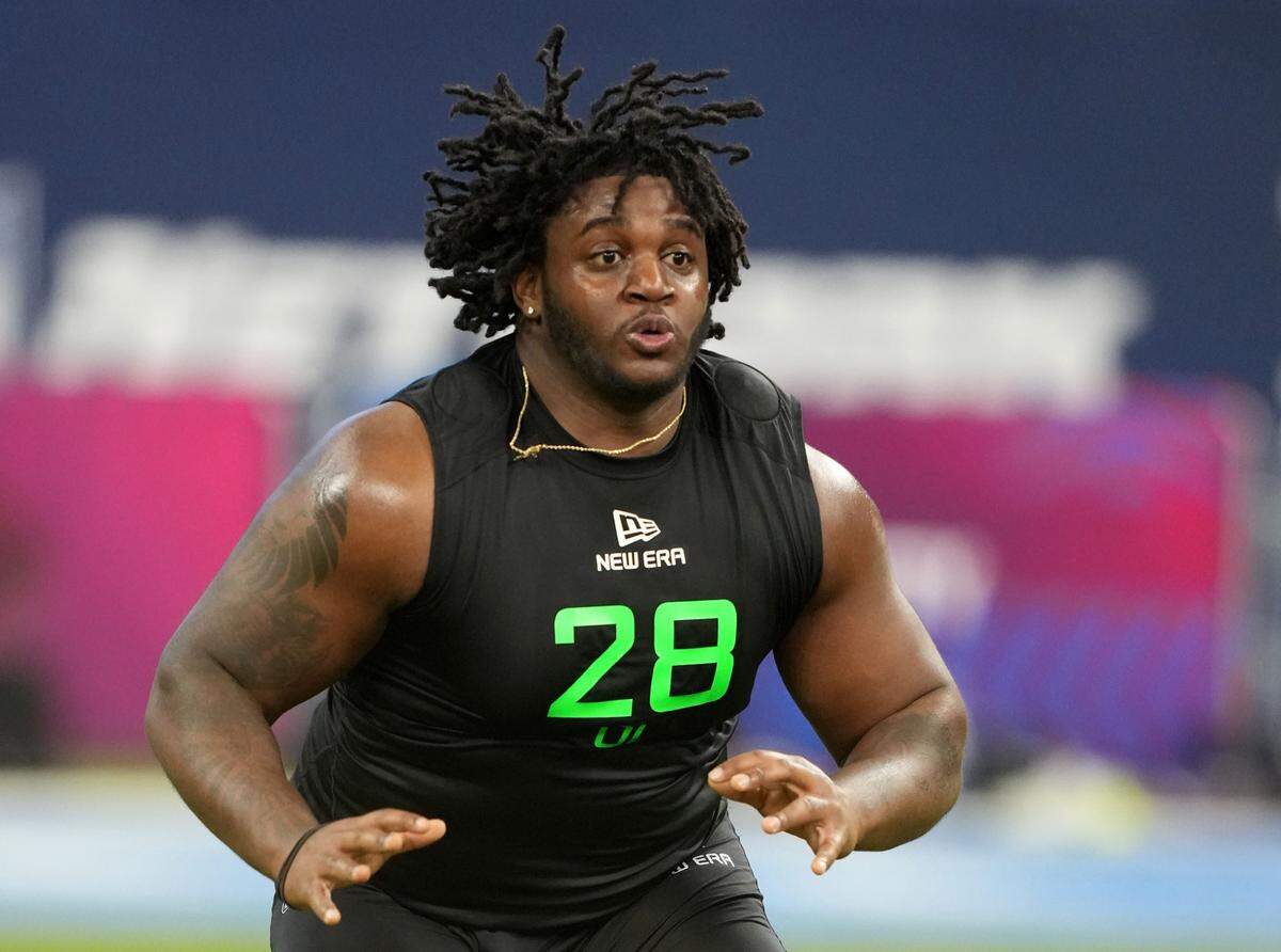 Offensive lineman Armand Membou runs through drills during the 2025 NFL Scouting Combine at Lucas Oil Stadium in Indianapolis on Sunday, March 3, 2025.