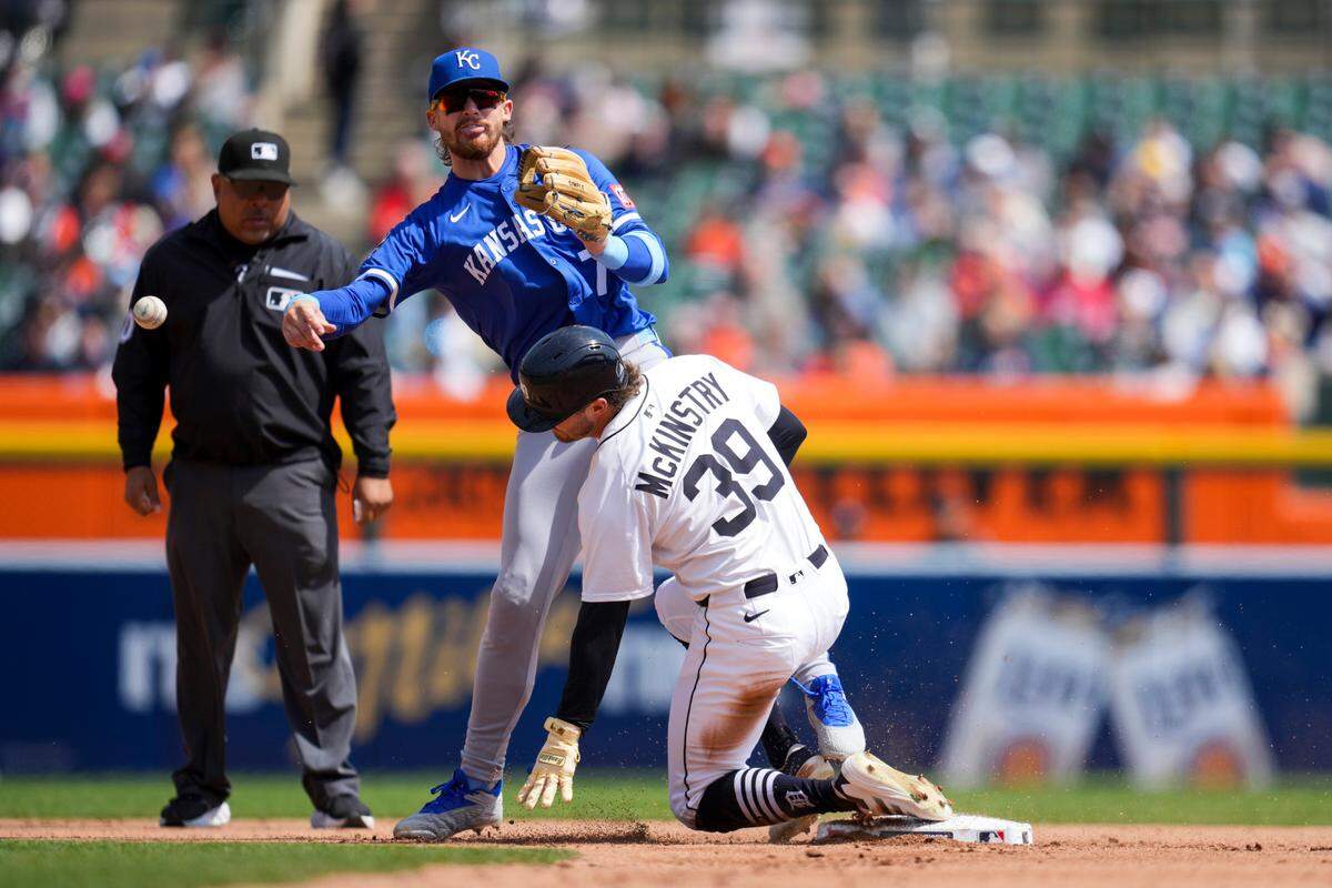 Kansas City Royals shortstop Bobby Witt Jr. gets the force-out on Tigers outfielder Zach McKinstry at second base during a Major League Baseball game at Comerica Park in Detroit on Sunday, April 20, 2025.