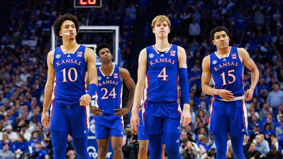 Kansas Jayhawks forward Jalen Wilson (10), forward KJ Adams (24), guard Gradey Dick (4) and guard Kevin McCullar Jr. (15) walk down the court during the second half against the Kentucky Wildcats at Rupp Arena on Jan. 28, 2023.