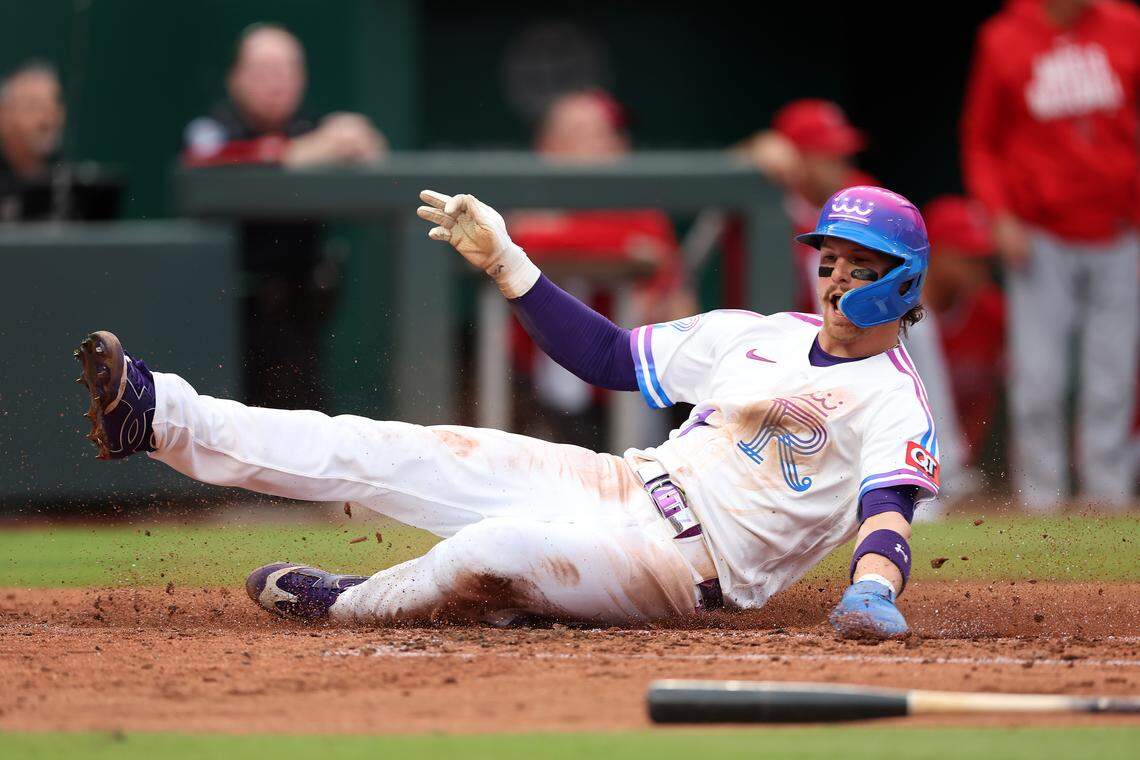Bobby Witt Jr. #7 of the Kansas City Royals slides safely into home plate to score during the 3rd inning of the game against the Los Angeles Angels at Kauffman Stadium on April 25, 2026 in Kansas City, Missouri.