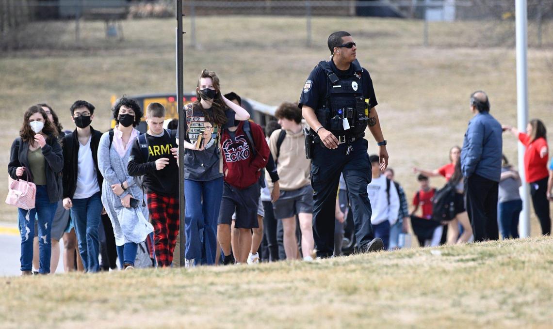 Olathe East High School students were led off buses to reunite with their parents at Pioneer Trail Middle School in Olathe after the March 4 shooting.
