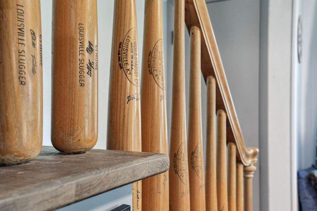 A staircase inside Whitey Herzog’s former house is made of baseball bats.