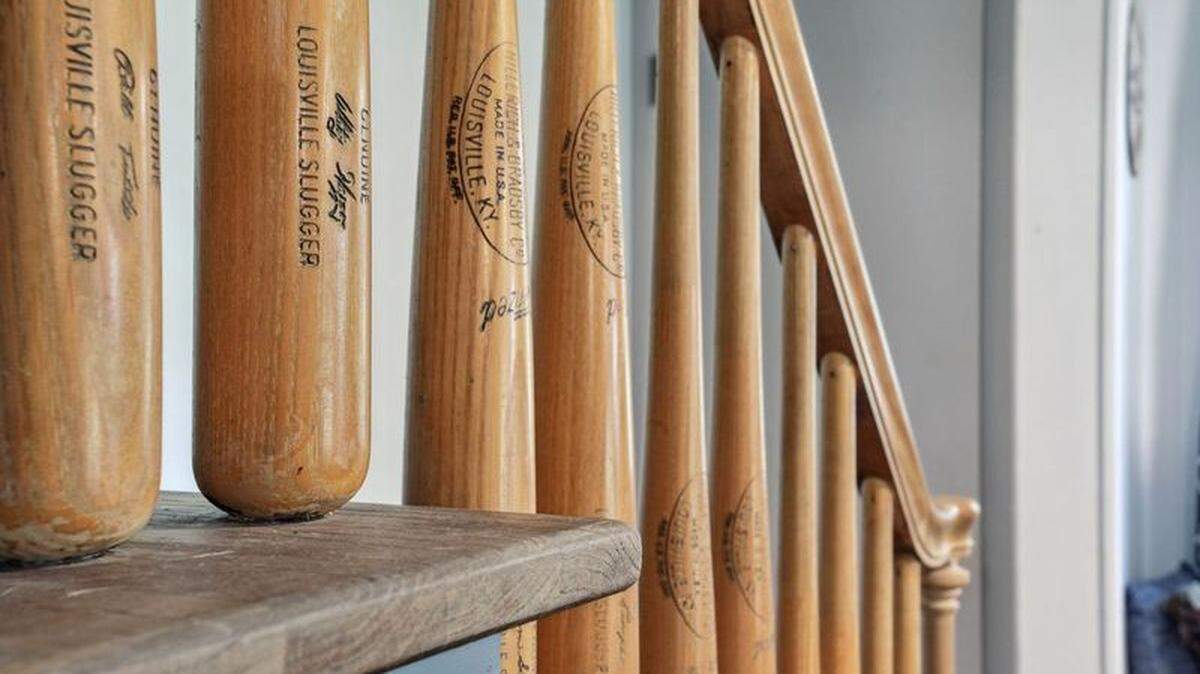 A staircase inside Whitey Herzog’s former house is made of baseball bats.