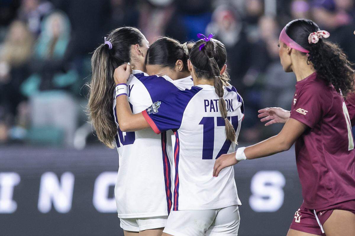 TCU midfielder Emma Yolinsky (18) and defender Cameron Patton (17) console forward Seven Castain after the Horned Frogs’ loss to Florida State in a College Cup national semifinal Friday at CPKC Stadium in Kansas City, Mo.
