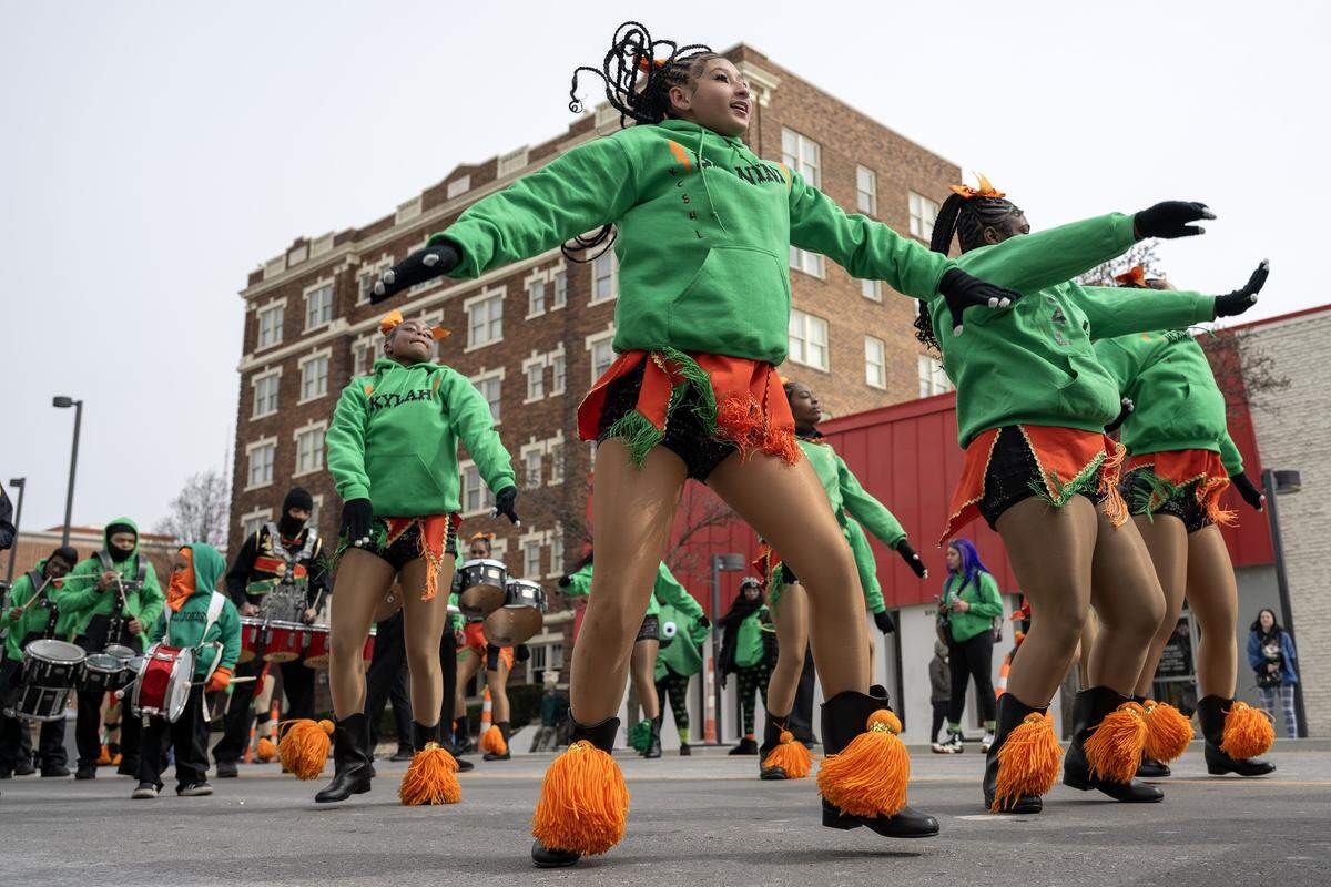 KC Marching Sizzlers dance during the St. Patrick's Day parade along Broadway Boulevard on Tuesday, March 17, 2026, in Kansas City.