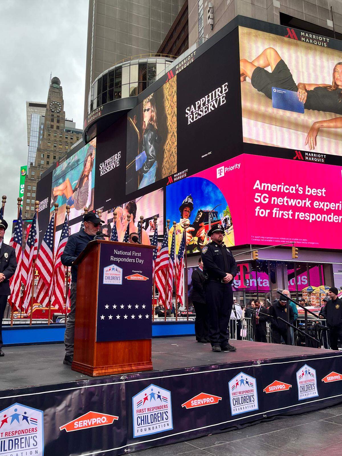 Lee’s Summit Officer Cameron Price is pictured on the Times Square stage with Jon Stewart receiving the Hero Award at the National First Responders Day Roll Call of Heroes on Tuesday, Oct. 28, 2025, in New York City’s Times Square.