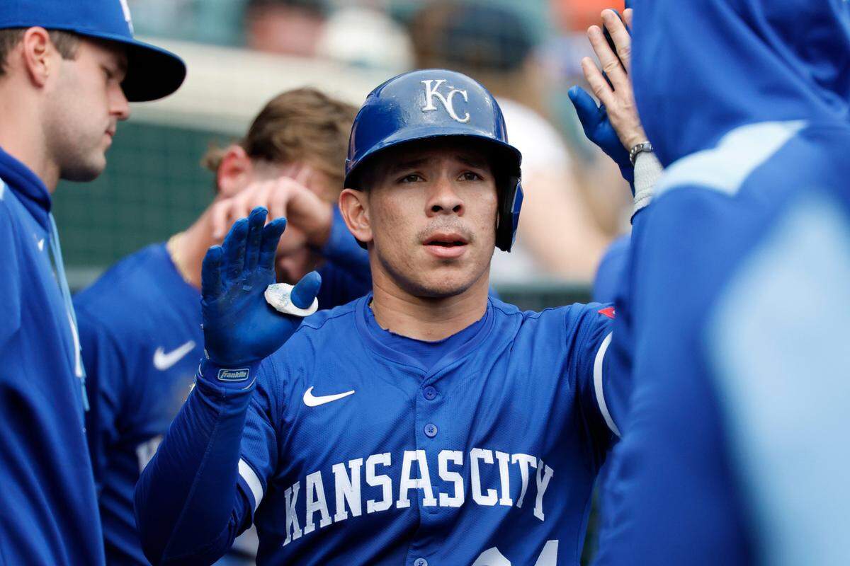 Kansas City Royals catcher Freddy Fermin receives congratulations from teammates after he hits a home run in the seventh inning against the Detroit Tigers at Comerica Park on Apr 19, 2025 in Detroit, Michigan, USA. 