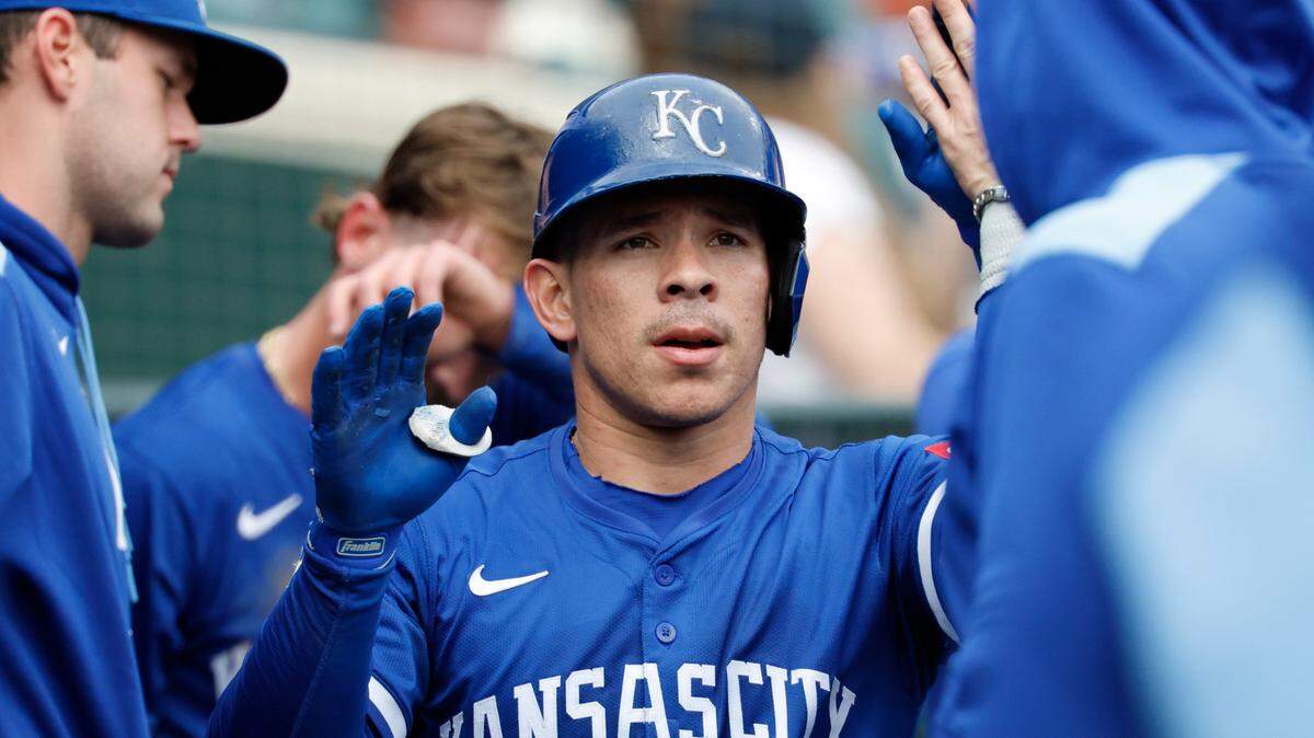 Kansas City Royals catcher Freddy Fermin (34) receives congratulations from teammates after he hits a home run in the seventh inning against the Detroit Tigers at Comerica Park on Apr 19, 2025 in Detroit, Michigan, USA.