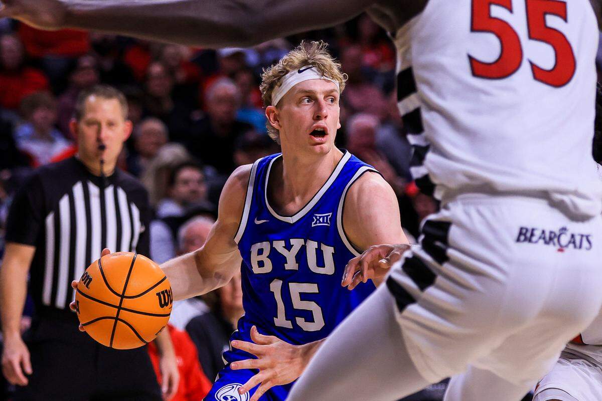 BYU Cougars forward Richie Saunders (15) dribbles against the Cincinnati Bearcats in the second half at Fifth Third Arena on Feb. 8, 2025.