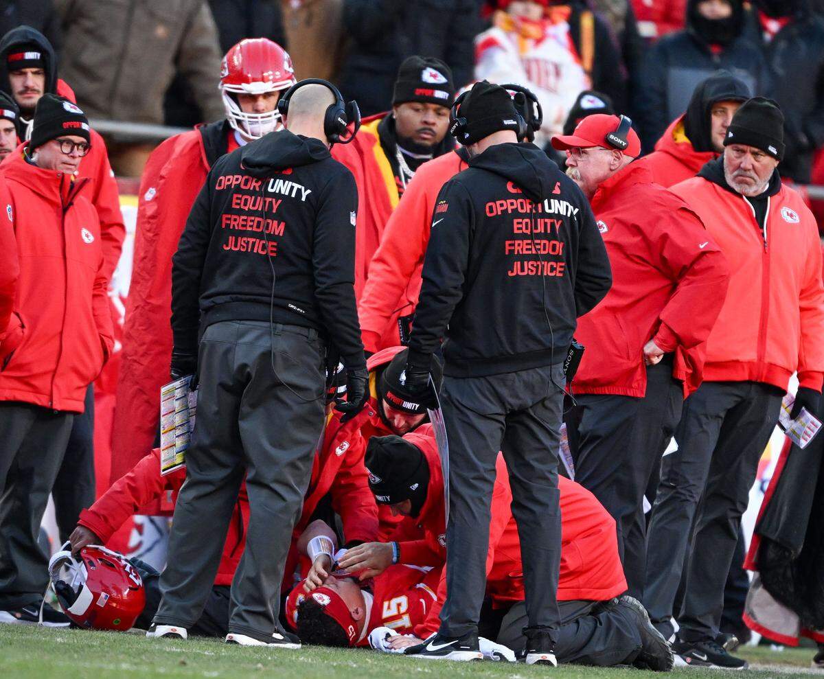 Kansas City Chiefs quarterback Patrick Mahomes (15) is injured in the fourth quarter against the LA Chargers at GEHA Field at Arrowhead Stadium on Sunday, Dec. 14, 2025.