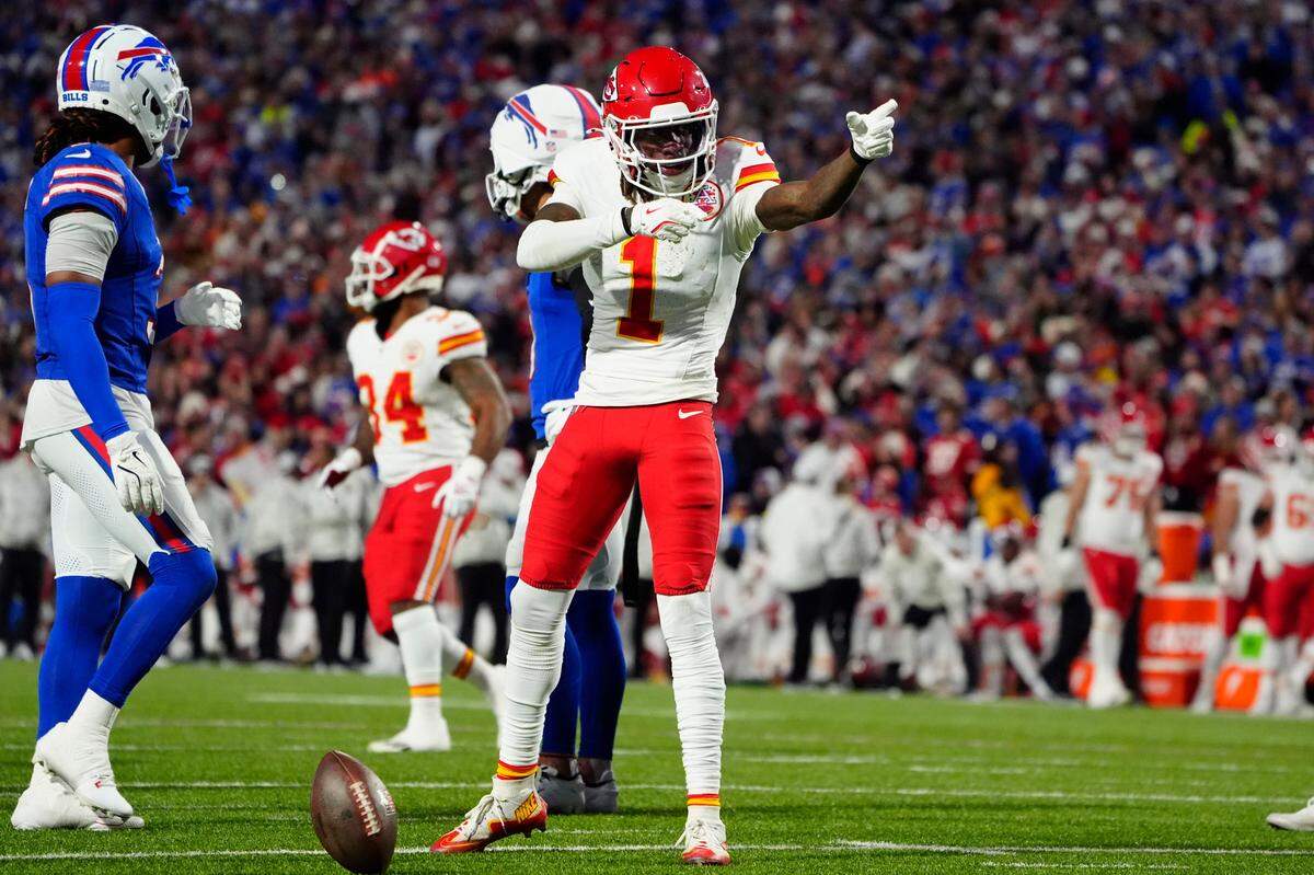 Kansas City Chiefs wide receiver Xavier Worthy (1) signals a first down against the Buffalo Bills during the first half at Highmark Stadium.