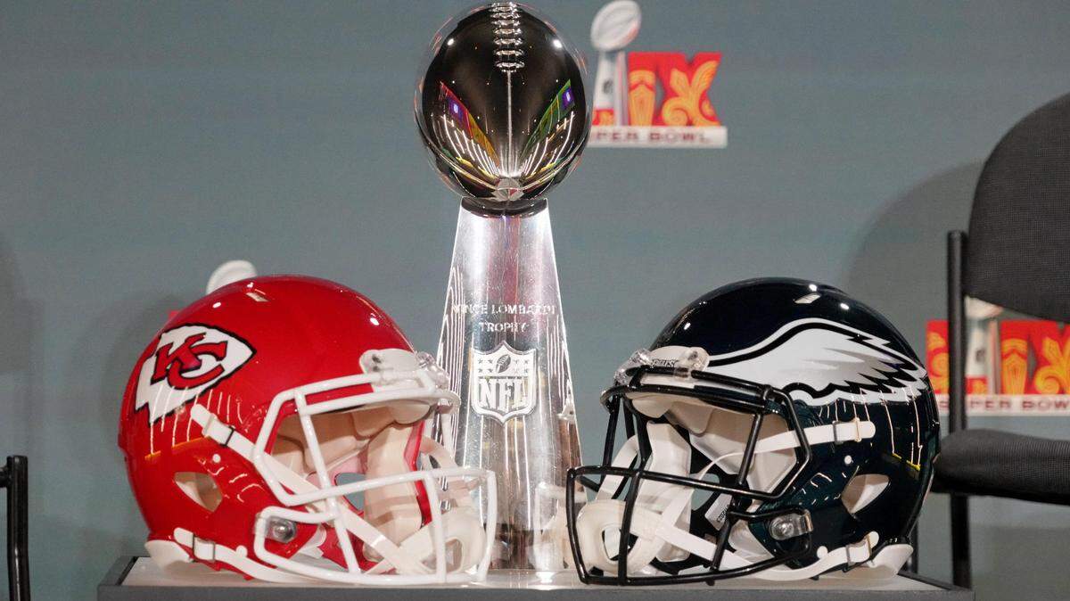 A detailed view of the Vince Lombardi Trophy and Chiefs/Eagles helmets before a press conference ahead of Super Bowl LIX in New Orleans on Feb. 3, 2025.