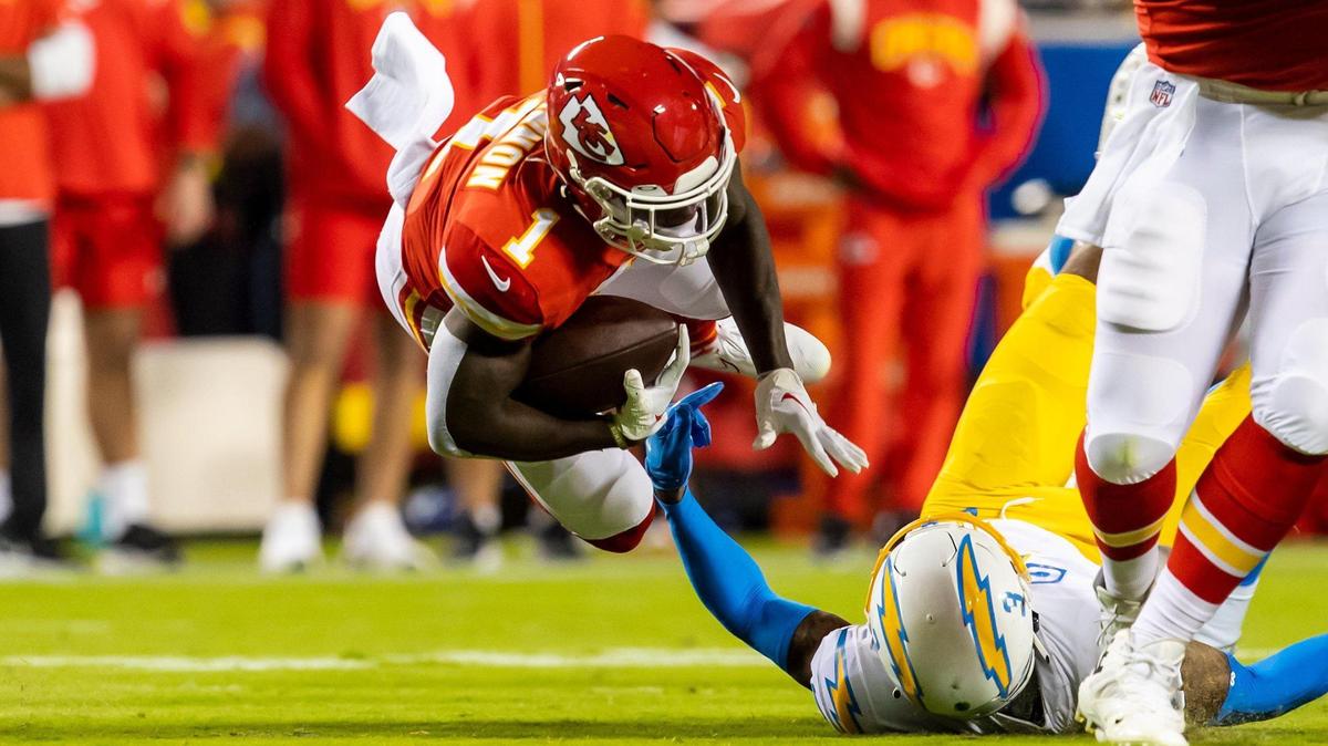 Kansas City Chiefs running back Jerick McKinnon (1) dives forward for extra yardage during the home opener between the Kansas City Chiefs and the LA Chargers on Thursday September 15, 2022 at GEHA Field at Arrowhead Stadium in Kansas City, Missouri