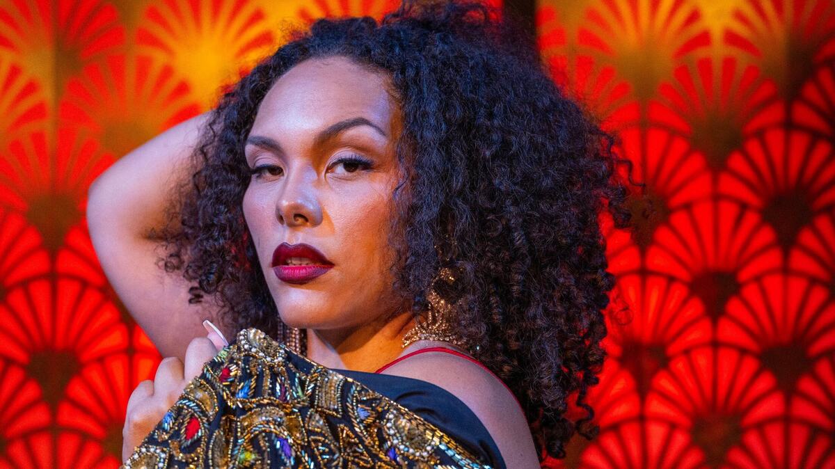 Lacey Knight, burlesque artistic director, poses for a photo at the Ruby Room at MTH Theater on Monday, Aug. 19, 2024, in Kansas City.