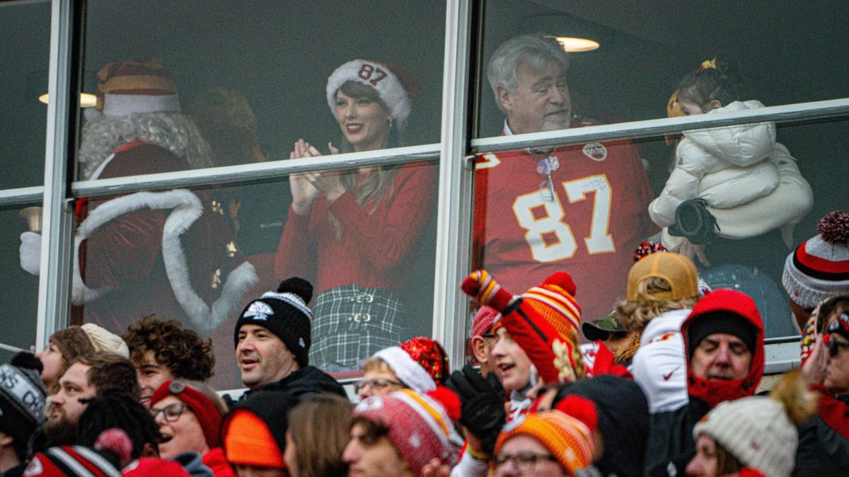 Taylor Swift watched the Kansas City Chiefs play the Las Vegas Raiders in a suite with Travis Kelce’s father, Ed Kelce, Monday at GEHA Field at Arrowhead Stadium.
