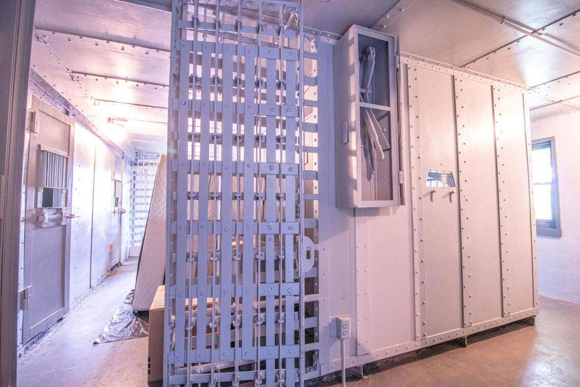 Attached to a home for sale in Fayette, Missouri, is a nine-cell jail that includes this security door.