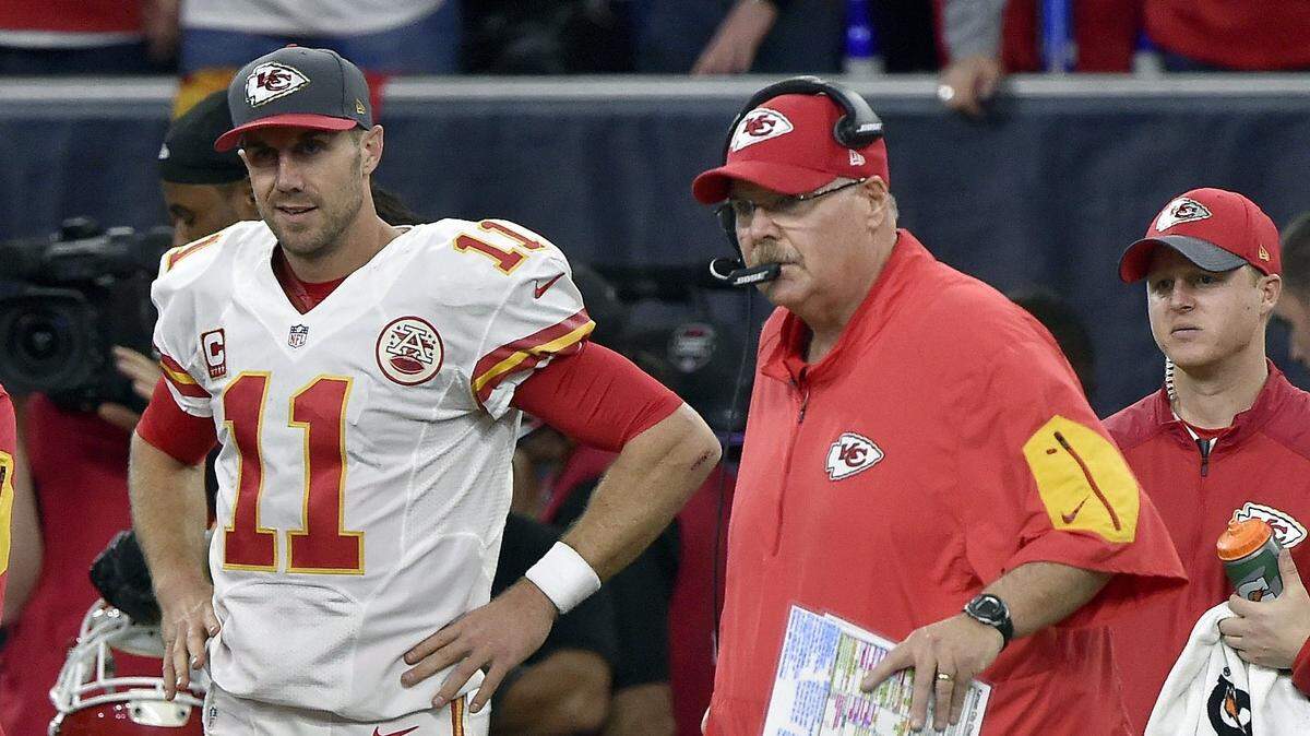 Kansas City Chiefs quarterback Alex Smith (11) watches next to head coach Andy Reid in the closing minutes of Saturday’s AFC Wild Card football game against the Houston Texans on January 9, 2016 at NRG Stadium in Houston, Texas.