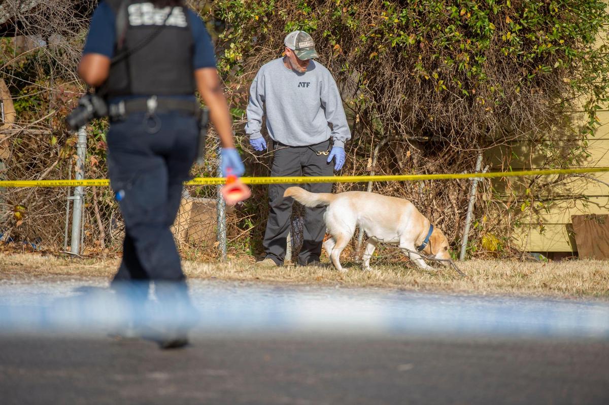 Kansas City police brought a crime scene evidence dog to help investigate a homicide near 41st Street and Monroe Avenue on Friday.