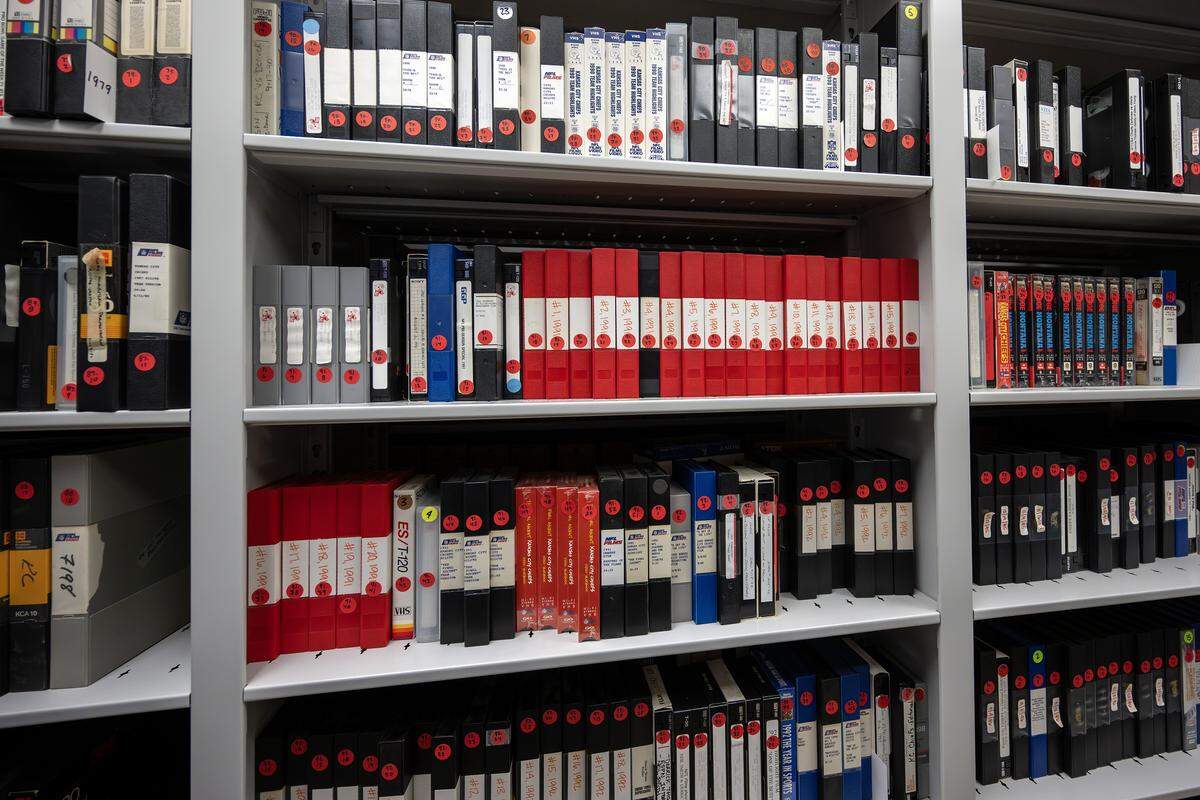 Video footage of the Kansas City Chiefs, recorded on tapes and in other formats, is stored inside the Rolling Rack Room at the team’s underground storage facility in Kansas City.