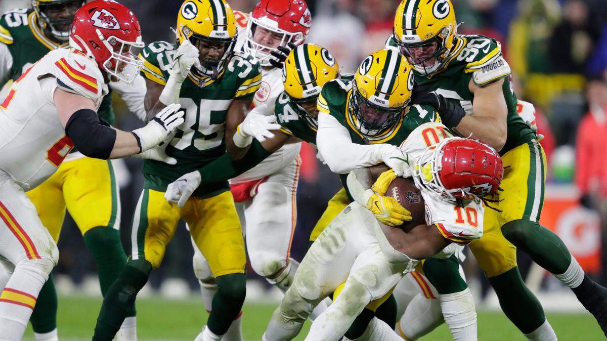 It took multiple Green Bay Packers players to bring down Chiefs running back Isiah Pacheco (No. 10) on more than one occasion during Sunday night’s game at Lambeau Field.