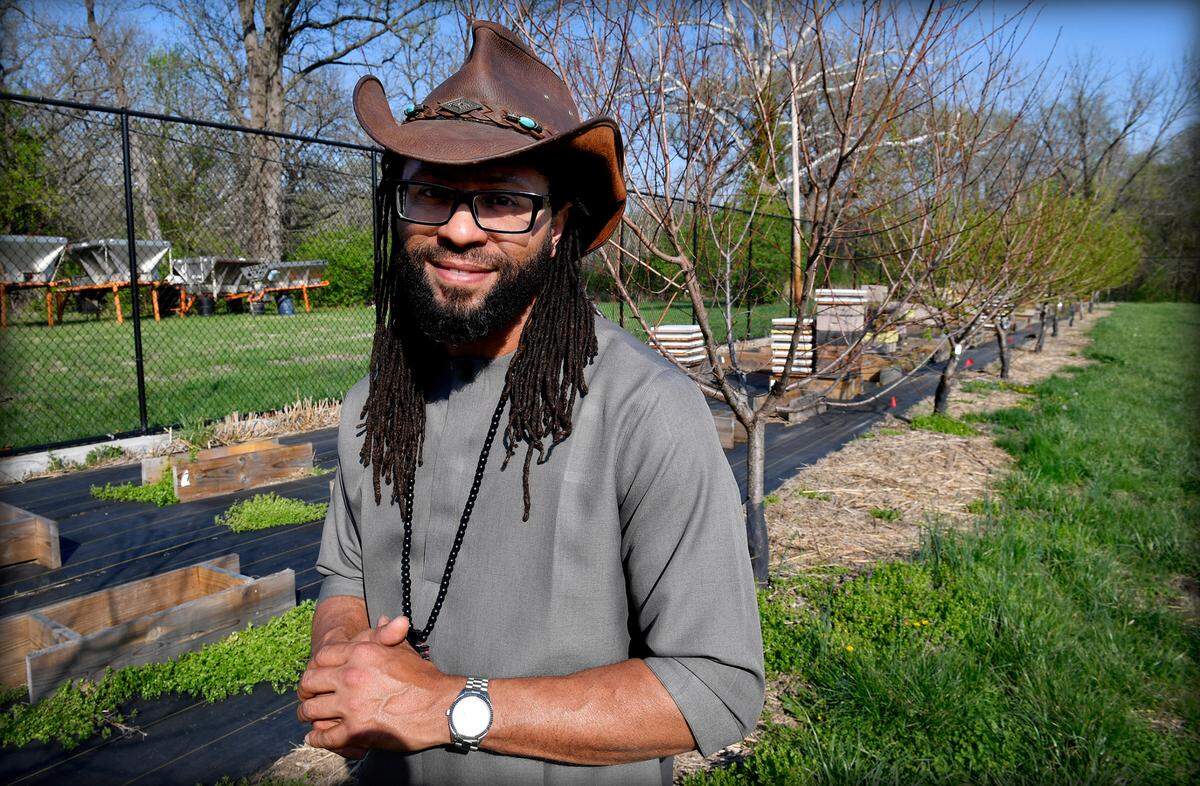Darrian Davis, who has lived in 64128 for 15 years, co-owns several businesses that include an urban farm cooperative. He is seen here at the Kansas City Urban Orchard.