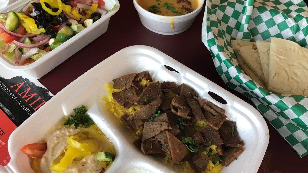 The gyro plate at Amir comes with hummus, pita bread and choice of soup or salad.