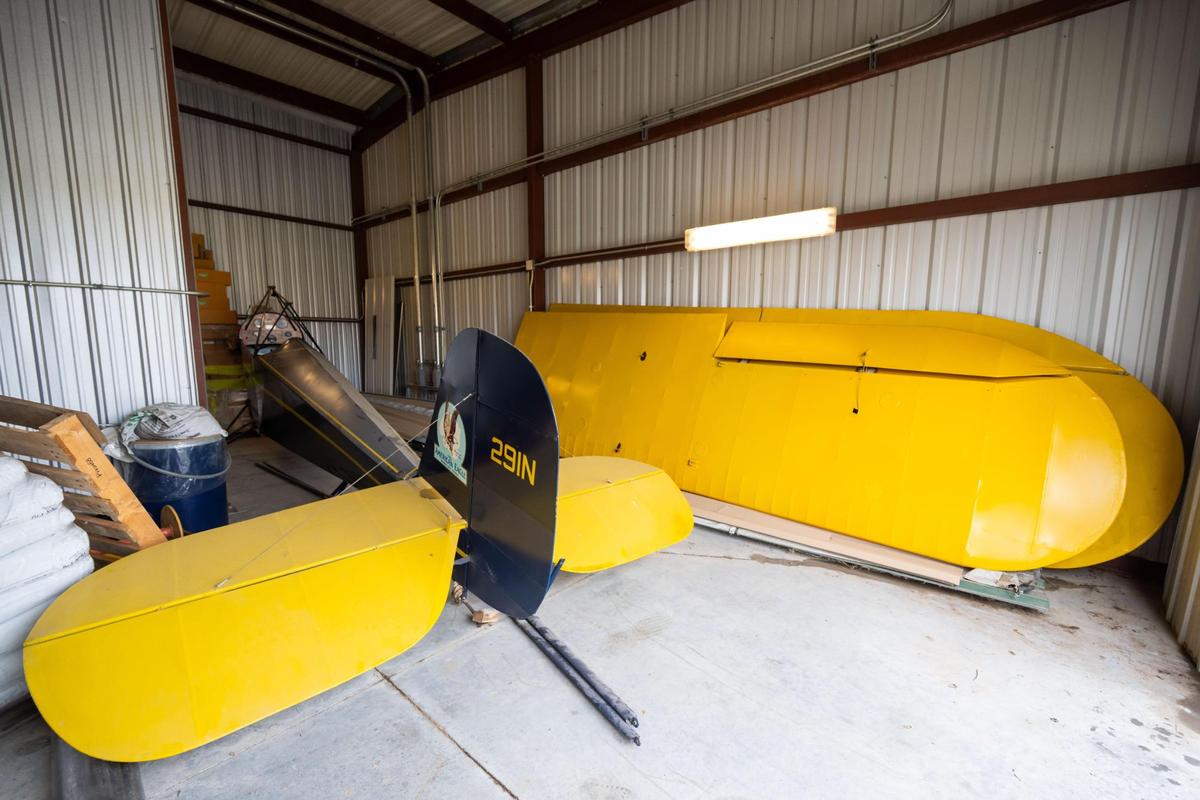The American Eaglet, a vintage single-engine plane built in Kansas City, Kansas, sits in a storage garage at Charles B. Wheeler Downtown Airport in Kansas City on Tuesday, May 20, 2025. The plane was originally supposed to be on display per the wishes of Gene Morris who restored the plane.