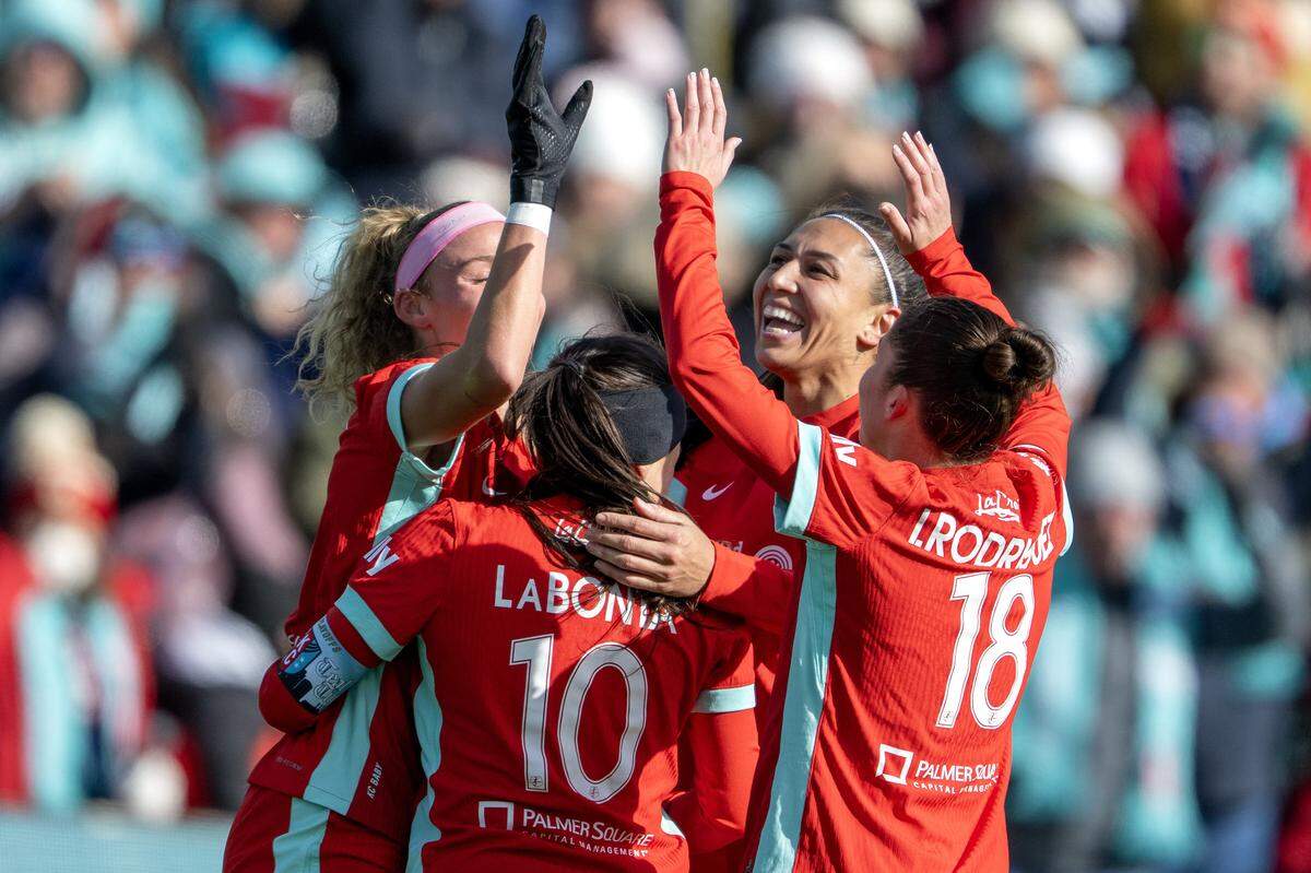 KC Current players celebrate a goal by defender Ellie Wheeler during an NWSL playoff game against Gotham FC at CPKC Stadium in Kansas City on Sunday, Nov. 9, 2025.