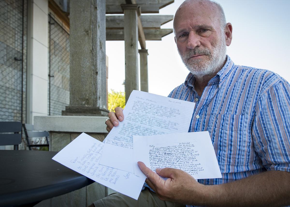 David McKune, former warden at Lansing Correctional Facility, displays correspondence between himself and Toby Young (now Dorr).