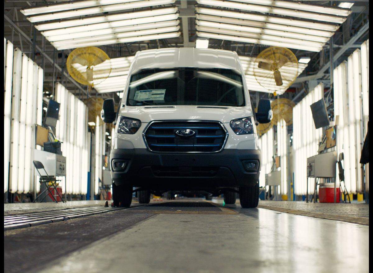 A Ford E-Transit van is shown inside the automaker’s Kansas City Assembly Plant. Ford just delivered the first models of its all-electric cargo van.