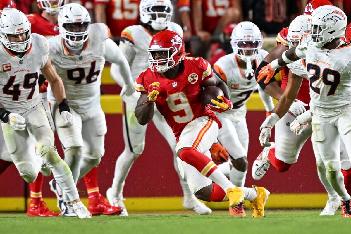 Kansas City Chiefs running back Kenneth Walker III (9) runs the ball in the Kansas City Chiefs vs. Denver Broncos NFL season opener at Arrowhead Stadium in Kansas City on Sept. 14, 2026.