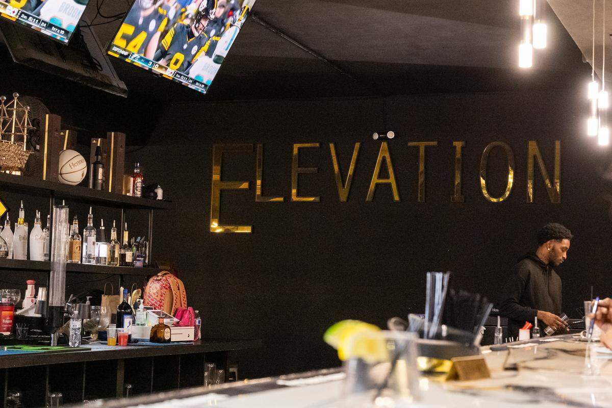 The bar area at Elevation Grille in Raytown. The establishment owned by former Chiefs player Alfonso Hodge serves standard bar food and drinks and recently became the new home for Soul Sessions, Kansas City's longest running open mic night.