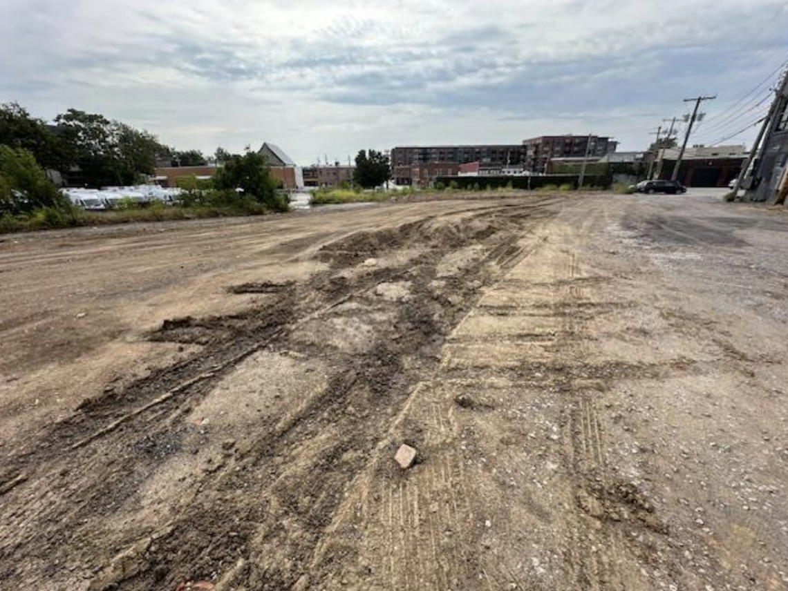 Despite not owning it, Warehouse on Broadway bulldozed an abandoned lot behind its Westport music venue. Concertgoers have been parking there, to the chagrin of residents on the block.