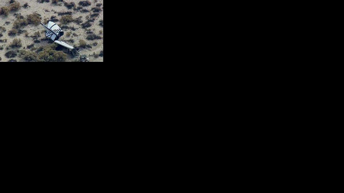 This image from video by KABC TV Los Angeles shows wreckage of what is believed to be SpaceShipTwo in Southern California's Mojave Desert on Friday, Oct. 31, 2014. A Virgin Galactic space tourism rocket exploded after taking off on a test flight, a witness said Friday. (