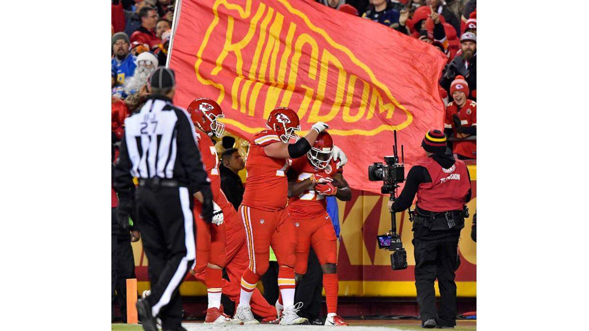 Kansas City Chiefs running back Darrel Williams was congratulated by teammate Chiefs guard Andrew Wylie after Williams’ first-quarter touchdown reception against the Los Angeles Chargers in Kansas City. It was Chiefs quarterback Patrick Mahomes’ 45th touchdown pass of the 2018 regular season.